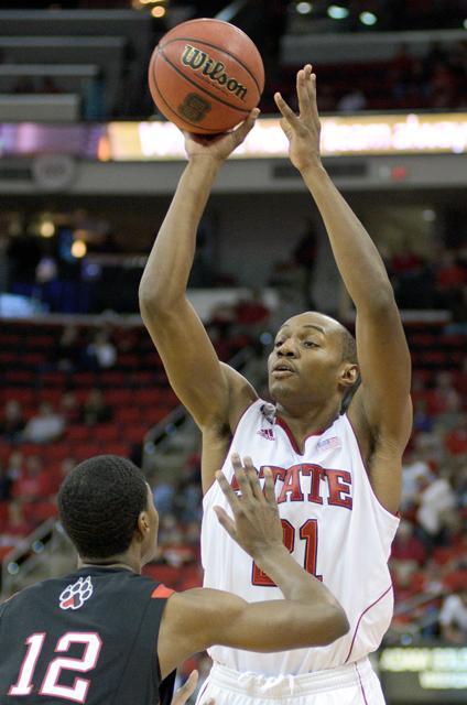 Senior guard C.J. Williams takes a shot during the basketball game against Northeastern in the RBC Center on Thursday, Dec. 22. The Wolfpack went on to defeat the Huskies 88-59. Photo by John Joyner.