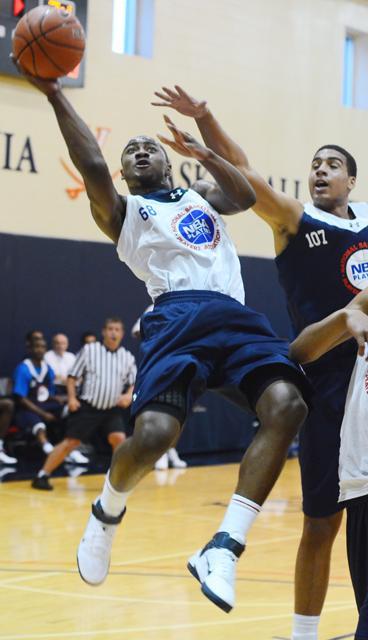 N.C. State men's basketball recruit Rodney Purvis takes a shot during a scrimmage at the NBA Top 100 camp at the University of Virginia June 17. Photo by Alex Sanchez.