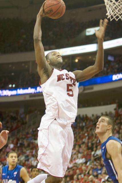 Sophomore forward C.J. Leslie goes to the basket over Duke's Miles Plumlee on Jan. 19, 2011 night at the RBC Center. Photo by Dreier Carr.