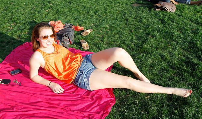 Students lay-out in the Court of Carolina to begin perfecting their summer bronze. Photo by Oliver Shoulder