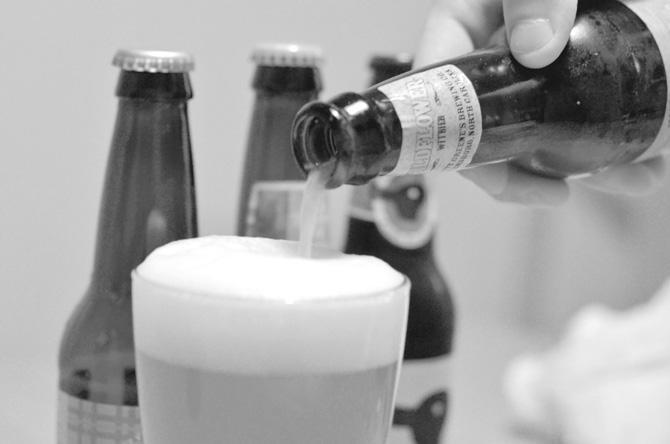 Natty Greens' Belgian-style witbier, Wildflower, is a light wheat beer with a pale color, lacking a full body like others of the style. Photo by Alex Sanchez