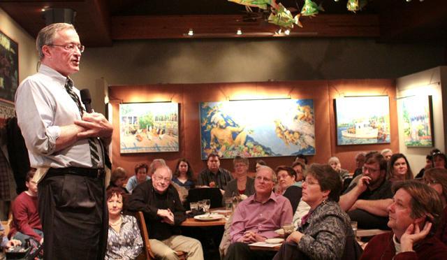 Dr. Thomas Gualtieri speaks about the neuroscience of love at Irregardless Caf&#233;, Feb. 21, 2012. Gualtieri argued that love is merely the result of brain chemistry and genes. Photo by Katherine Hoke