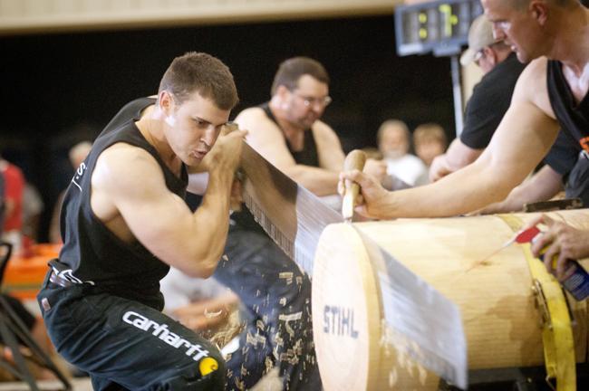 Logan Scarborough, N.C. State alum and former national champion, competes in a timbersport competition. Photo courtesy of STIHL Timbersports