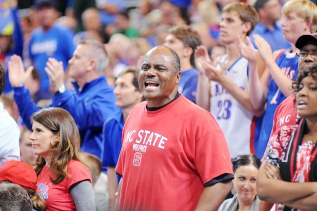 Wendell Williams, father of senior guard C.J. Williams, cheers on the Wolfpack during its contest against the Kansas Jayhawks on Friday in St. Louis, Mo. Photo by Jordan Moore.