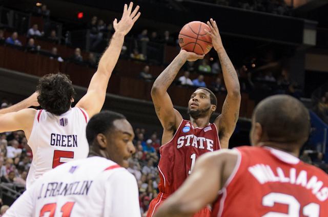 Junior foward Richard Howell takes a shot over San Diego State defenders in the first half of the second round of the NCAA Tournament in Columbus, Oh. The Wolfpack won the game, 79-65, with 22 points supplied by Howell. Photo by John Joyner.