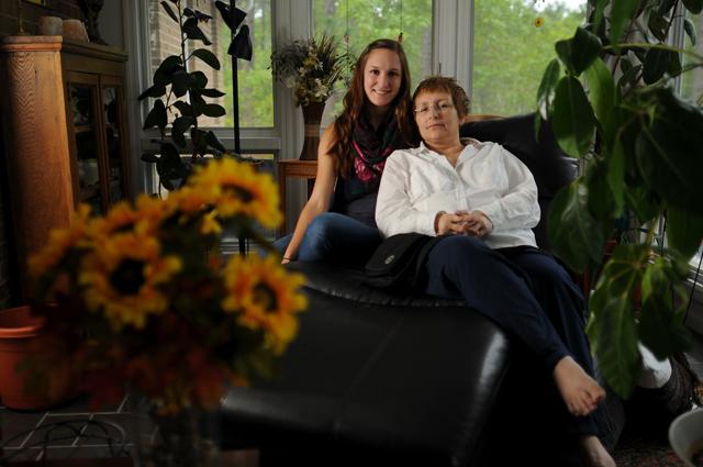 Josephine Yurcaba, a sophomore in English and philosophy, sits next to her mother, Paris, a cancer patient fighting stage IV peritoneal cancer. Photo by Jordan Moore.