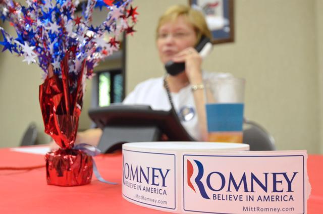 Volunteers at the Wake County Republican headquarters make calls to gather voter data.