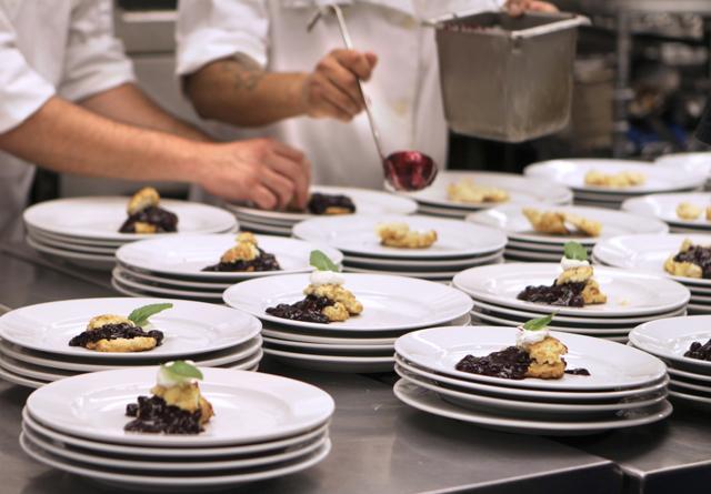 For the dessert round of Fire in the Triangle competition, chef Adam Jones of The Twisted Fork restaurant prepared blueberry ginger cobbler with bourbon biscuit and mint cream. "The inspiration for this dessert was my dad for Father's Day." Jones said. Photo by Jennifer Jung