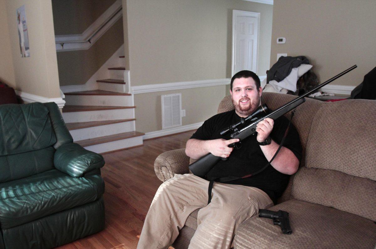 Ross Pilotte, a junior in fisheries and wildlife science, is the president of the N.C. State chapter of Students for Concealed Carry on Campus. He carries his SIG Saur p226 9mm pistol whenever he isn't on campus and also loves to hunt and go to the shooting range. Pilotte said he doesn't mind taking more classes or going through more thorough background checks, he just wants his right to concealed carry to be honored on campus. Photo by Katherine Hoke