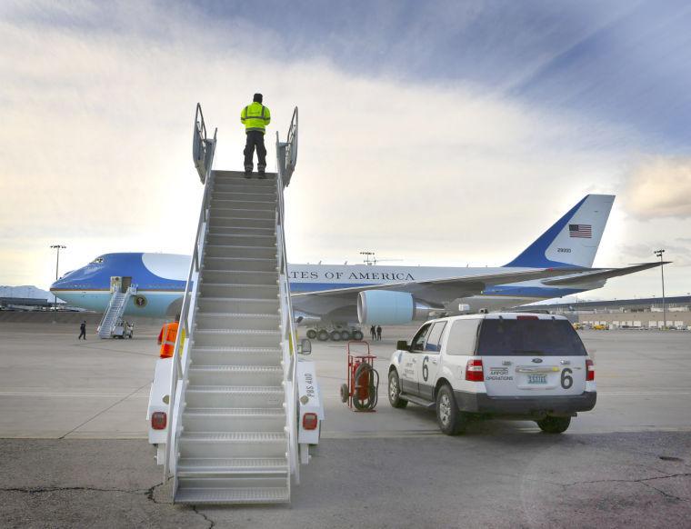 Ramp agent Weslee (CQ) Brown looks at Air Force One while parked at McCarran International Ariport Tuesday, Jan 29, 2013. President Obama unveiled his immigration reform proposal today during a speech at Del Sol High School.