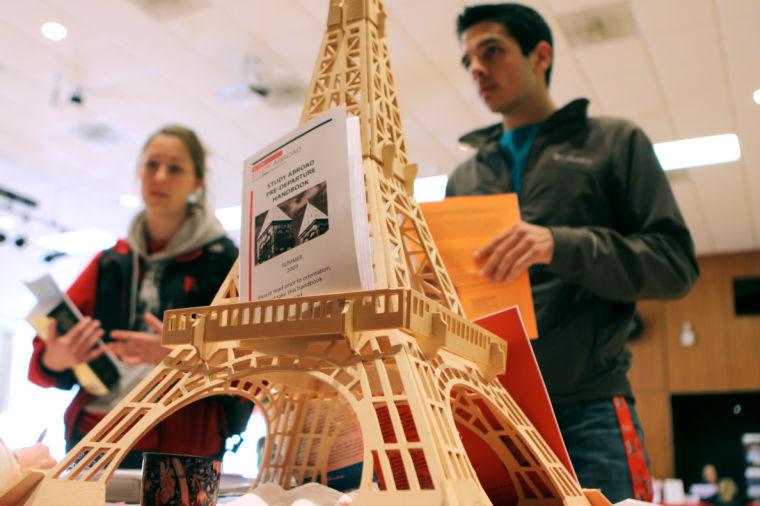 Sophomore in microbiology Ravi Dixit and Senior in international studies Adrienne Brooks discuss summer Study Abroad opportunities in Northern France Thursday afternoon. The Study Abroad fair focused on summer session programs offering classes for all majors, from engineering to anthropology.