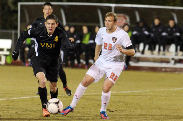 Senior midfielder Moritz Steidten passes the ball during the men's soccer game against VMI in Dail Soccer Stadium Monday Oct. 29, 2012. The Wolfpack defeated the Keydets 3-2 thanks to three unanswered goals in the first half. Photo by John Joyner.