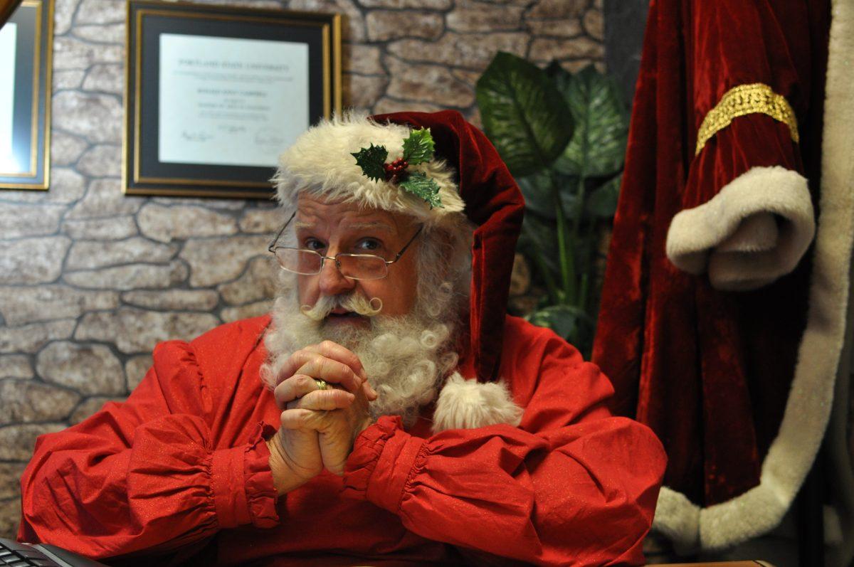 Dr. Ronald Campbell, professor in international business law at NCSU, doubles as Santa Claus during the holiday season.