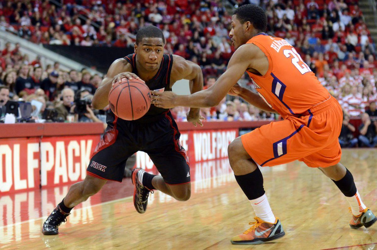 Freshman guard Rodney Purvis drives past the Clemson defense during the men's basketball game in PNC Arena Sunday, Jan. 20, 2013. The Wolfpack defeated the Tigers 66-62. Photo by John Joyner.