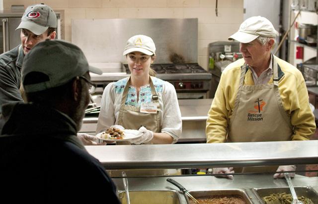 Rick Hughes, a medical distributor, Cameron Hicks, an accountant, and Will Raymond, a retired school administrator, serve food to the less fortunate at Raleigh Rescue Mission, a homeless and emergency shelter on East Hargett St. in downtown Raleigh on Nov. 27, 2012. The Mission, a faith-based non-profit agency helps local men, women, children with food, shelter, and education.