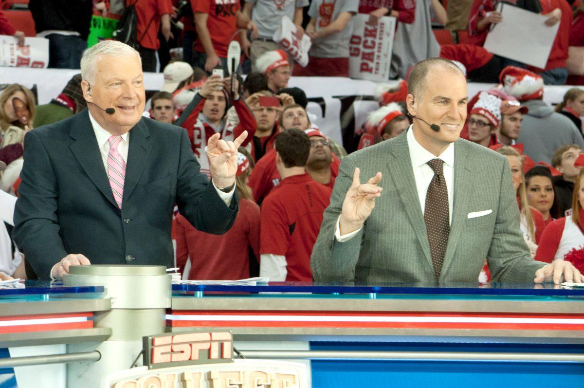 Digger Phelps and Jay Bilas throw up the Wolfpack sign on Jan. 26, 2013 in PNC Arena. Digger and Phelps are announcers that came to N.C. State as a part of ESPN College Gameday.&#160;