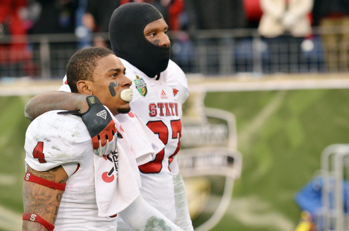 Redshirt senior wide reciever Tobias Palmer and redshirt senior tight end Mario Carter reflects on the Wolfpack's 38-24 loss to the Vanderbilt Commodores in the Franklin American Mortgage Music City Bowl against Vanderbilt in LP Field, Nashville, Tenn. Monday, Dec. 31, 2012. Photo by John Joyner.