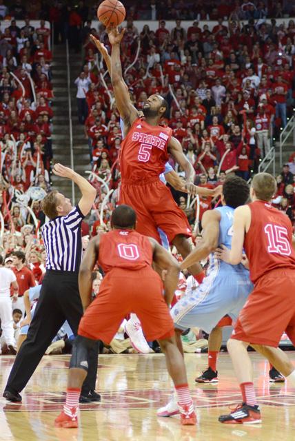 Junior forward C.J. Leslie jumps up for tip off at the start of the North Carolina game Saturday, Jan. 26. Leslie had 17 points and 10 rebounds in the Wolfpack's 91-83 win at the PNC Arena. Photo by Ryan Parry.