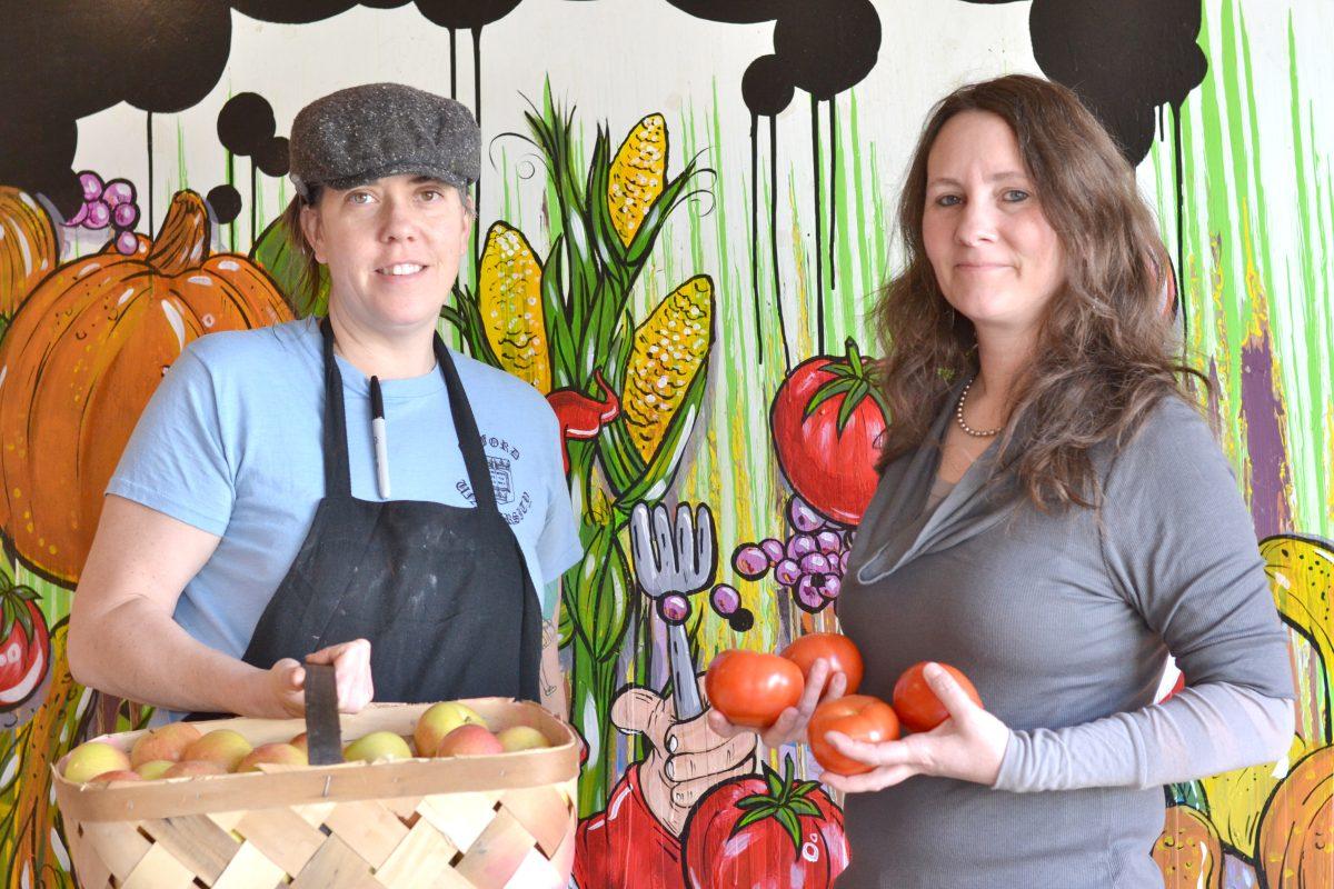 Carolina Morrison (left) and Siobhan Southern (right), co-owners of The Fiction Kitchen, pose at their restaurant on S. Dawson St. in Raleigh Friday Feb. 8, 2013. The restaurant, which opened on Jan. 16, specializes in vegetarian and vegan cuisine prepared with locally-grown ingredients. The Fiction Kitchen is open Tuesday through Thursday, 4:30 p.m. to 9:30 p.m. and 4:30 p.m. to 11:00 p.m. Friday and Saturday.