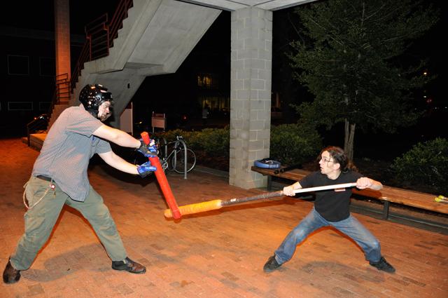 James Austin blocks an attack from Rob Nunley, a senior in creative writing. The two are members of the Sparring Group, who build homemade weapons of PVC pipe and foam. The group meets every Thursday at 10 P.M. outside Witherspoon Student Center.&#160;