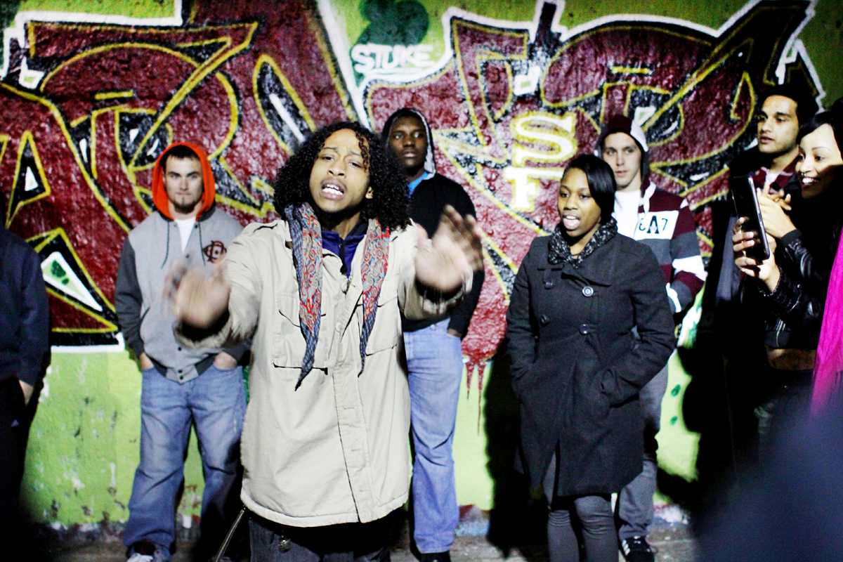 Davi Jones freestyles at the Monday Night Cypher by the Free Expression Tunnel just before midnight on Feb. 4. The weekly Cypher is a place where anyone can go to freestyle every Monday at 11:30 p.m.&#160;