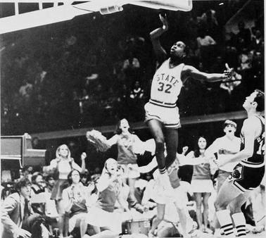 N.C. State player Al Heartley elevates to score a slam dunk in Reynolds&#160;Coliseum.