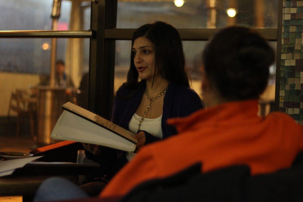 Katina Gad, a senior in retail and supply chain management, speaks at a local Strike Debt Raleigh event at Cup A Joe on Thursday Jan. 31, 2013. Attendees of the meeting discussed a student debt relief program based off of the "Rolling Jubilee" campaign in which student debts are forgiven through donation. Photo by Tyler Hawkins.