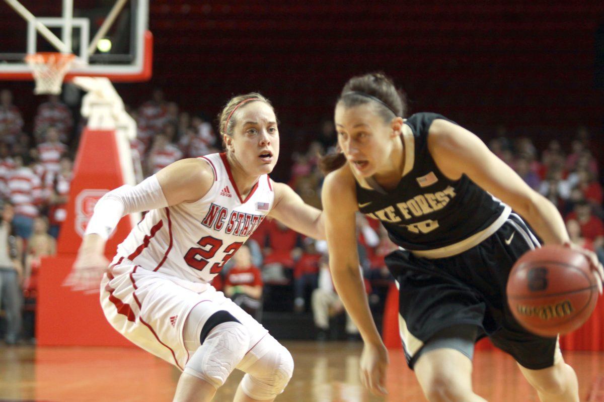 Photo by Joannah Irvin. Senior guard Marissa Kasttanek works to gain possession of the ball during the N.C. State 64-55 win against Wake Forest on Sunday Feb. 3 2013. The Wolfpack win improved its 11-12 over all and 3-8 in the ACC.