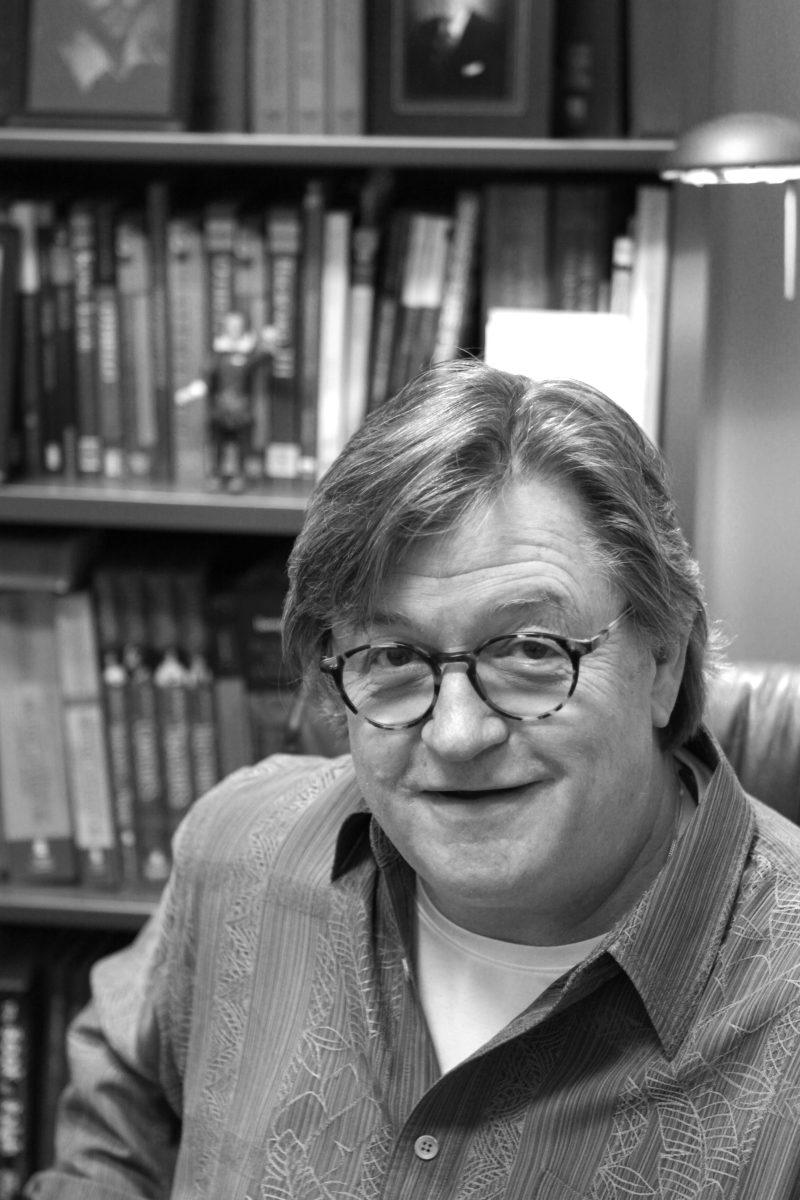 Photo by Joannah Irvin. Marvin Hunt, a professor in the English department, discusses his latest work on the Bahamas on Wednesday. "I want people so see the other side of the Bahamas," Hunt said, "In my book, I look at the history, social economics, and culture of the people there outside of the tourist industry".