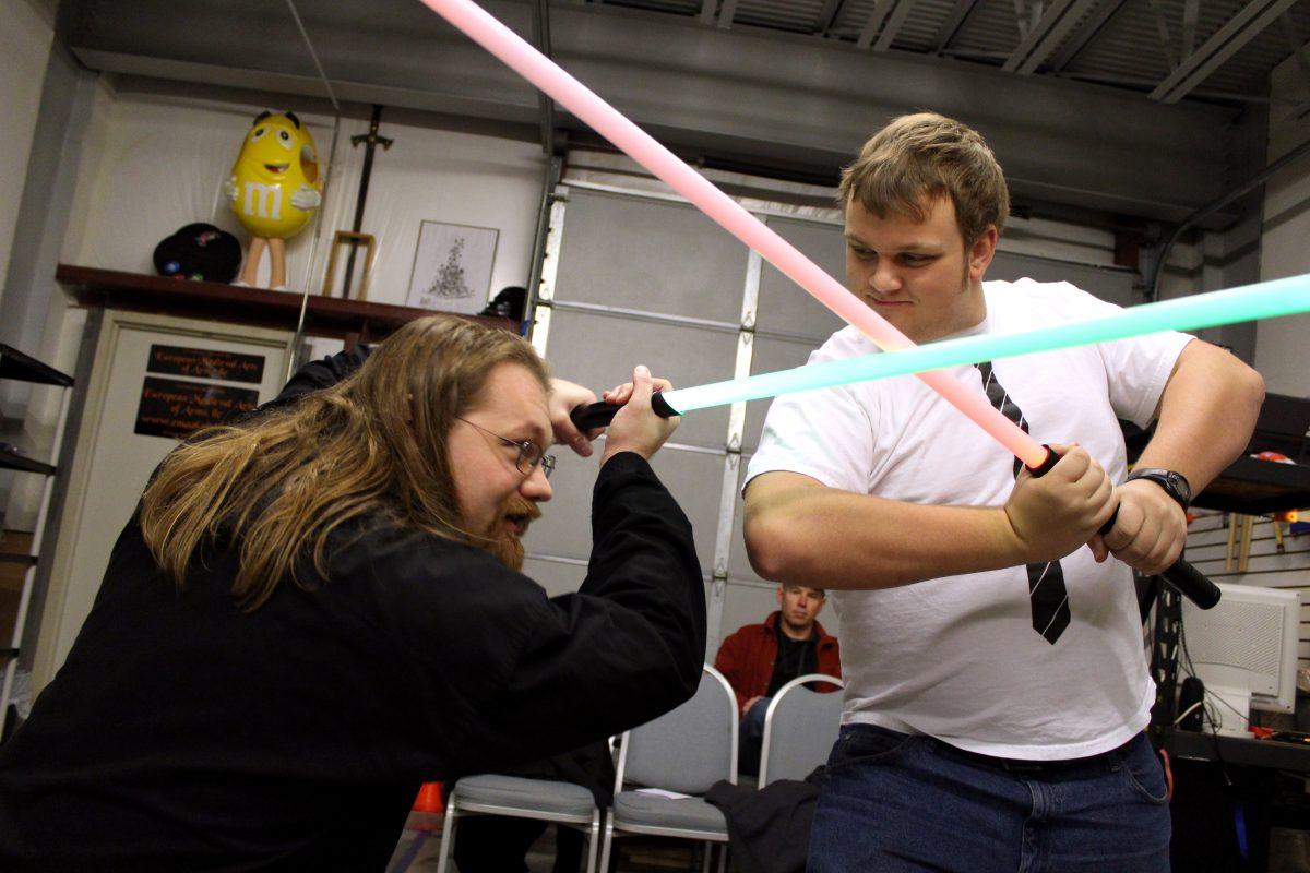 Josh Albert, 30 and Jesse Whiteside, a sophomore in computer engineering duel with lightblades showing off techniques Saturday Feb. 2, 2013 at European Medieval Arts of Arms in Cary. EMAA offers a variety of swordfighting and martial arts classes.