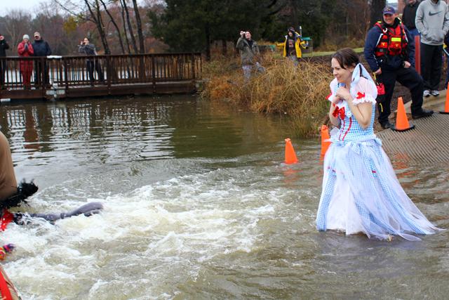 Emergency Communications Supervisor for N.C. State Campus Police Kim Womble hesitates to run into the chilly Lake Raleigh water during the N.C. State Polar Plunge February 23. The eigth annual Polar Plunge was organized by the Campus Police as a fundraiser for the Special Olympics. Photo by Katherine Hoke