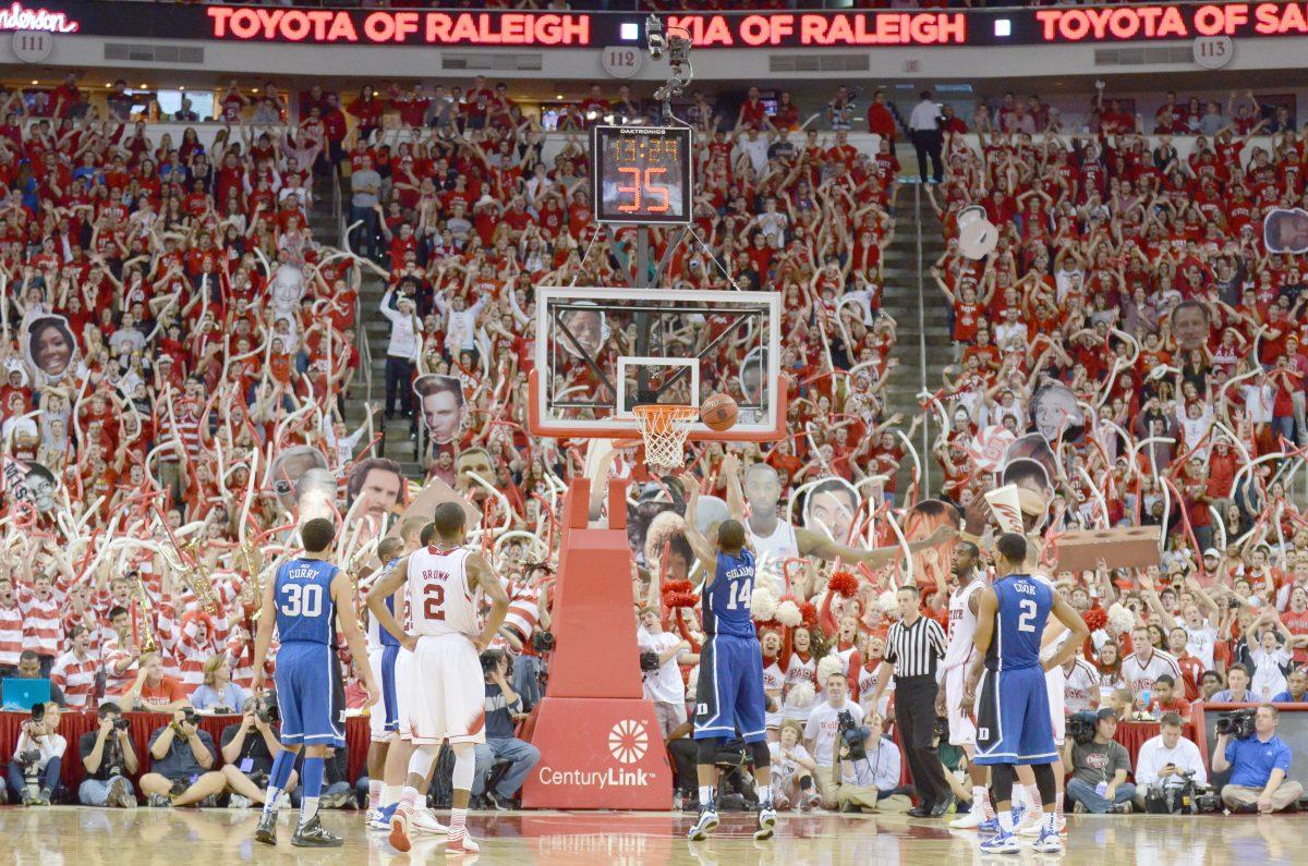 N.C. State fans attempt to distract as Duke freshman guard Rasheed Sulaimon attempts a free throw during the basketball game against Duke in PNC Arena Saturday, Jan. 12, 2013. The No. 20 Wolfpack defeated the No. 1 Blue Devils 84-76. Photo by John Joyner.