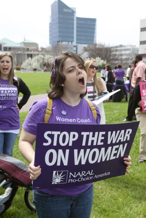 Laura Owens, a senior in theater and Women &amp; Gender studies at UNC-Greensboro, makes her voice heard at Not in Her Shoes rally on Wednesday.&#160;