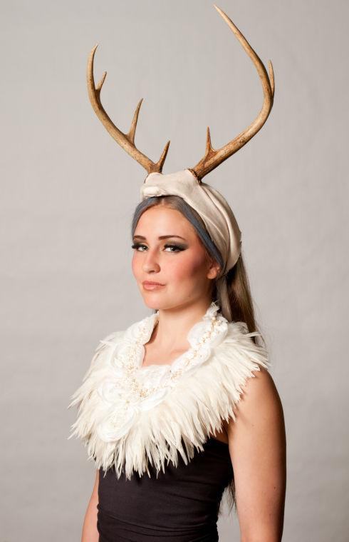 A model wears a design by local accessory retailer, Melissa Lowery. Lowery, who is both the owner and a designer at SSD Jewelry, focuses her talents on off-the-wall designs. Inspired by Native American headdresses, Lowery tries to incorporate a &#8220;heavy tribal modern nomad feel&#8221; to every piece she creates.