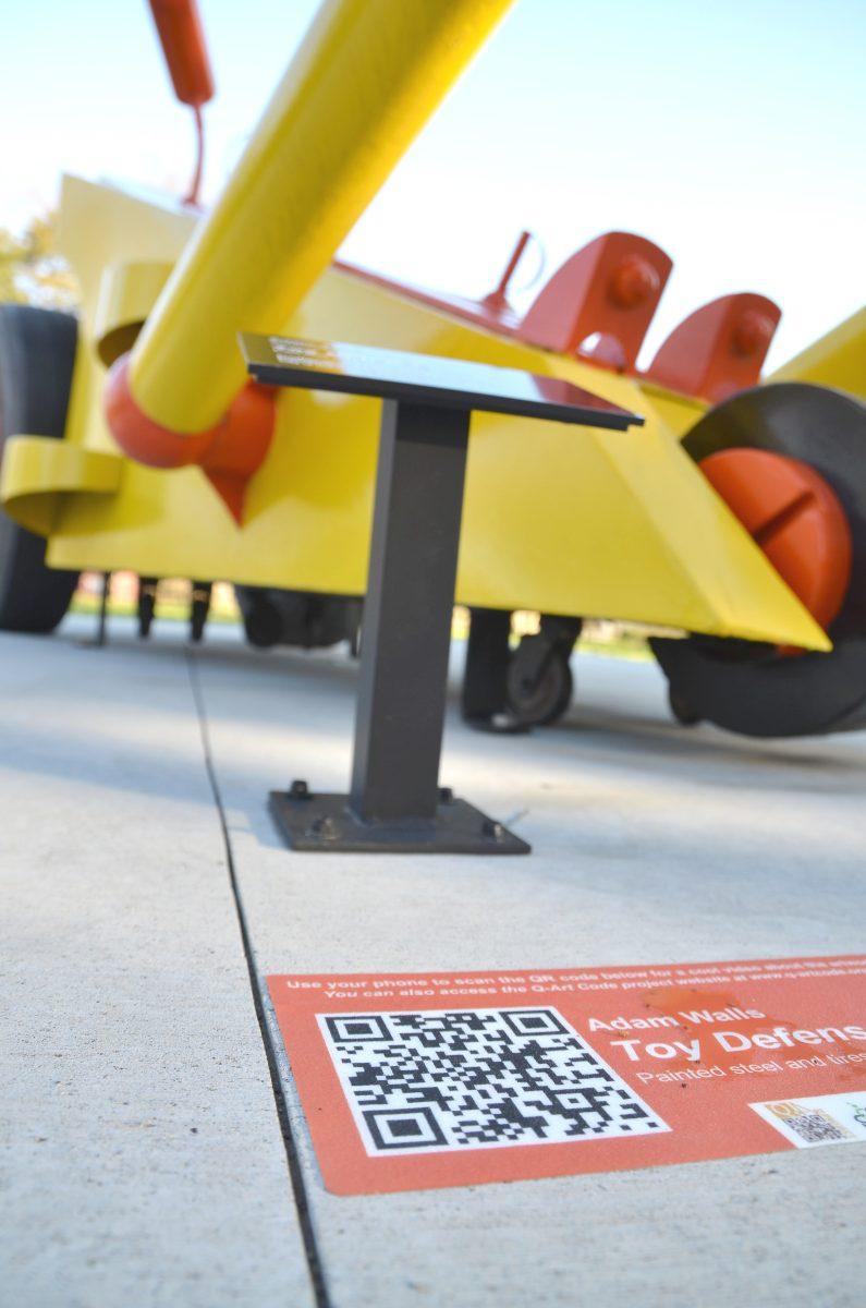 The City of Raleigh recently completed a $15,000 project to place QR codes near various pieces of public artwork around Raleigh. The codes can be scanned with a smartphone to provide the viewer with information about the piece. Photo by John Joyner.