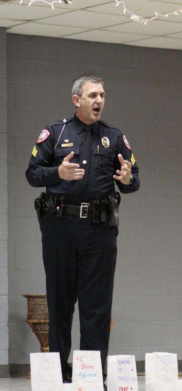 Sergeant Bill Davis speaks at the event, Take Back the Night.