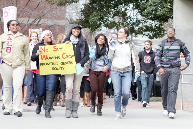 NC State students march to Witherspoon Student Center Monday evening March 25, 2013 as part of the 26th annual Take Back the Night event sponsored by the N.C. State Women's Center.