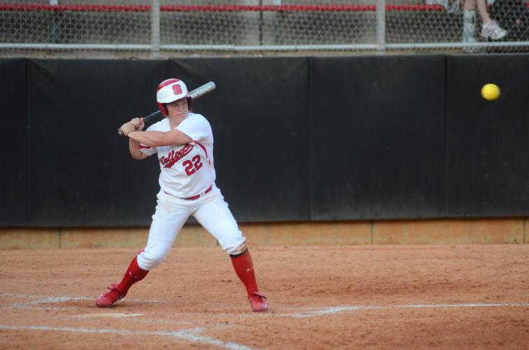 Junior outfielder Bethaney Wells prepares to swing at a pitch during the second game of a double header against UNCG at Curtis and Jacqueline Dail field March 23, 2011. State won the game 9-0 in five innings. Photo by Alex Sanchez.
