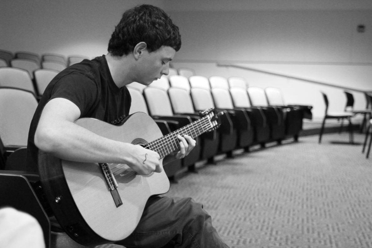 Sophomore in electrical engineering Nicholas Casale plays an original song at the Spectacular Open Mic Art Display (SOMAD) in Riddick Hall on Feb. 4. SOMAD is a club that Casale founded in order to create a place for people to present anything they have created. Previous performers have played music, read poetry, given reflections on their weeks, brought food, showed videos and more. The group meets every Sunday at 6 pm.