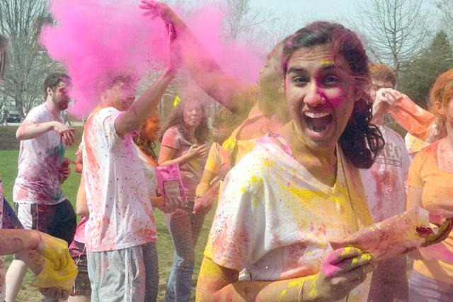 Sophomore in business administration Maya Krishnan partakes in the Hindu festival Holi on Harris Field Saturday.&#160;