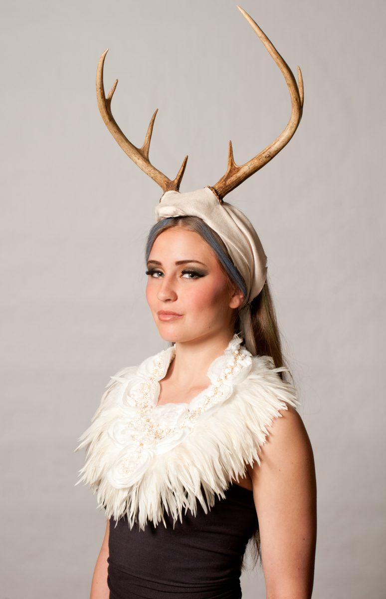 A model wears a design by local accessory retailer, Melissa Lowery. Lowery, who is both the owner and a designer at SSD Jewelry, focuses her talents on off-the-wall designs. Inspired by Native American headdresses, Lowery tries to incorporate a &#8220;heavy tribal modern nomad feel&#8221; to every piece she creates.