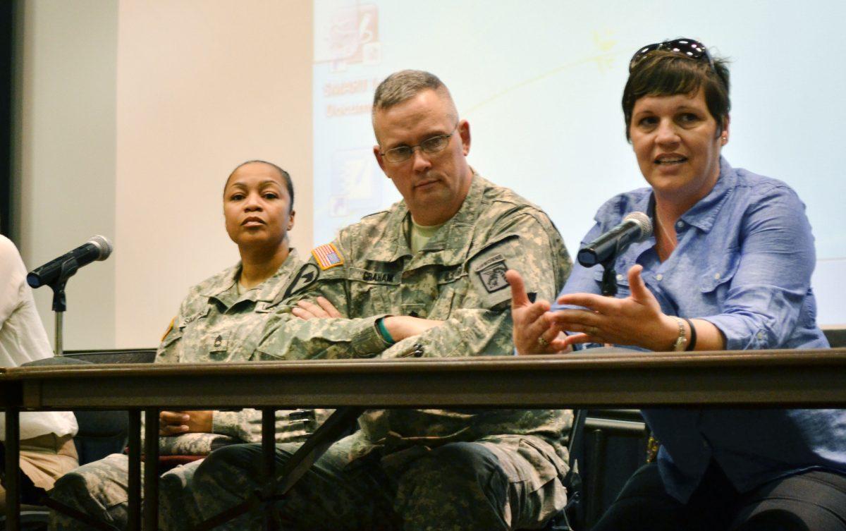 Sgt. Kellie Berg (right) helps open the discussion of topics raised by the documentary "The Invisible War", which examines sexual assault within the military, Tuesday, April 2 in Witherspoon. The panel included both university staff and military personnel.&#160;