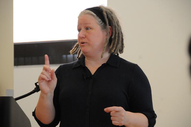 Dr. TL Taylor, Associate Professor, Comparative Media Studies at MIT, speaks about live-streaming of video games in online environments at Caldwell Lounge on April 11, 2013. She discussed E-sports as a profession for some individuals and how they stream their play on websites such as Twitch.tv. "Television is failing to keep up with online media, such as live-streaming." Taylor said. Photo by: Sam O'Brien