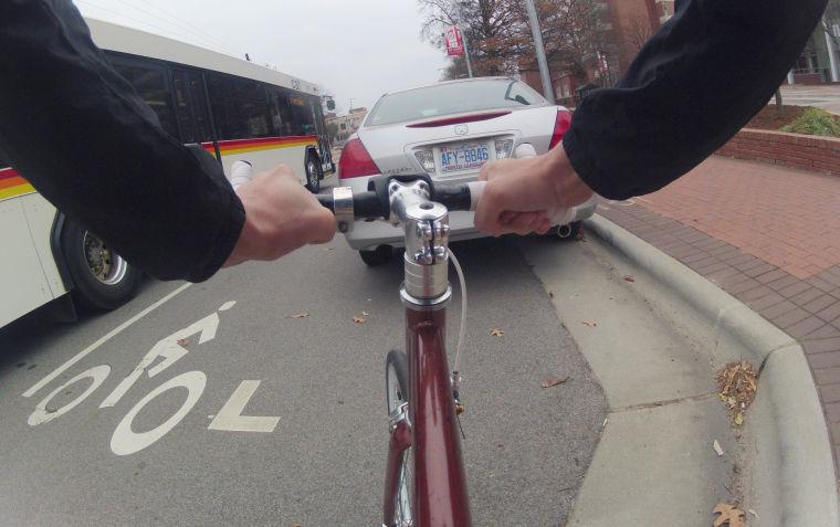 Claustrophobic bike lane on Hillsborough Street near campus.