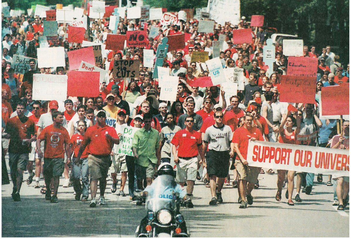 An estimated 5,000 marchers took Hillsborough Street by storm on their way downtown to protest possible UNC System budget cuts of $125 million on April 5, 2001. Students from other UNC System schools joined in the N.C. State effort.