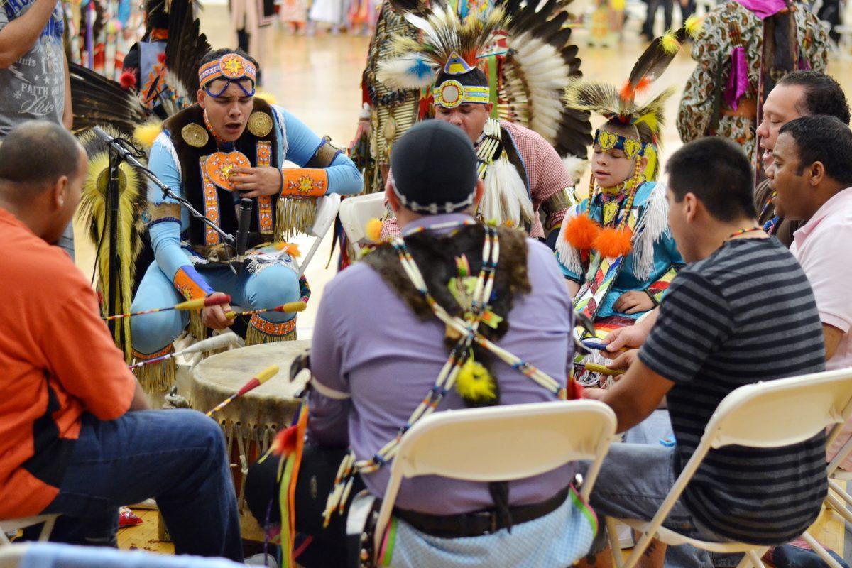 The Southern Sun Singers perform at N.C. State's 23rd annual Native American Pow Wow April 6, 2013 in Carmichael Gymnasium. The event, hosted by the Office of Native American Student Affairs and NCSU Native American student organizations, featured cultural dances, songs, and ceremonies. Photo by Caide Wooten.