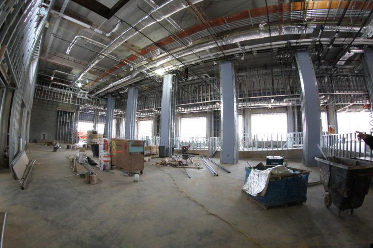 Shawn Hoch, associate director of dining services, and Joanna Minett, marketing and communications manager, gave a tour of the On The Oval Culinary Creations, which is still under construction. The new dining location on Centennial Campus will include various eateries that will serve salads, deli, pizza, rotisserie, asian and foods right off the grill. There will also be a diner that will be open early and stay open late.