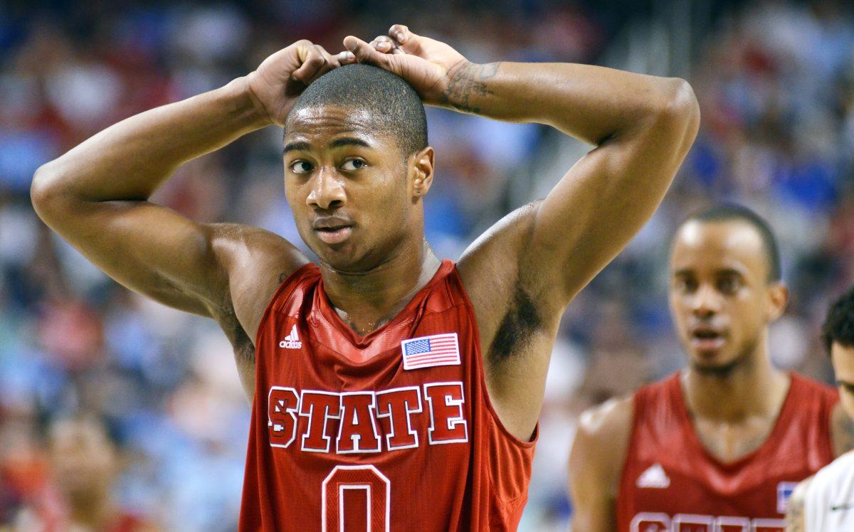 Freshman guard Rodney Purvis holds his hands above his head after a foul is called against N.C. State Saturday, March 16, 2013. Purvis had 6 points in the Wolfpack's 81-71 loss to the Miami Hurricanes at Greensboro Coliseum.