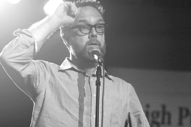 Aaron Belz shares an original story about his life in Raleigh during the 2013 Oak City Bard Brawl at King's Barcade Tuesday evening April 9 2013. Photo by Patrick Whaley.