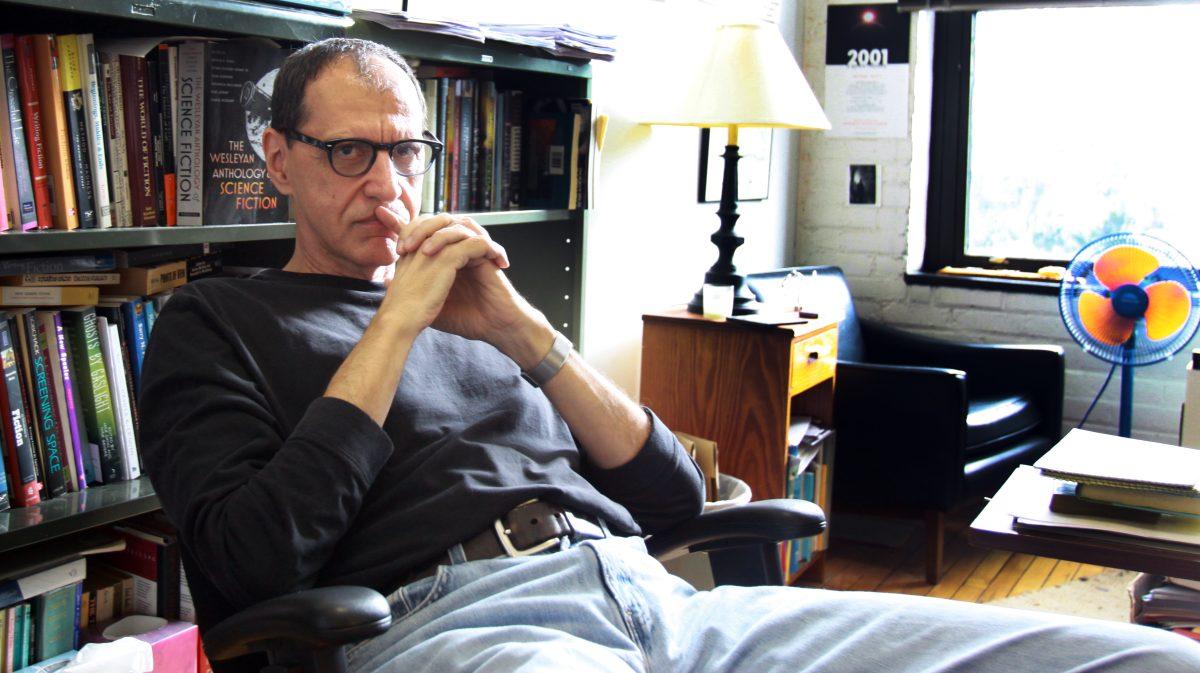 John Kessel, author of 'Corrupting Dr. Nice', sits in his office in Tompkins Hall on Jan, 30 2013. The award winning professor teaches science fiction and fantasy for the English department. "I have many books from students that have gone through my classes and have gone on to be published," Kessel said.